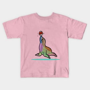 a happy seal is playing with the ball Kids T-Shirt